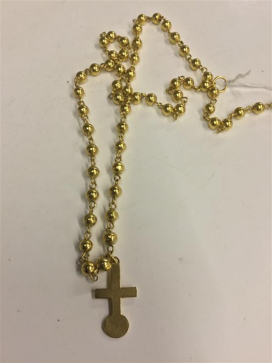 Yellow metal bead necklace with cross pendant